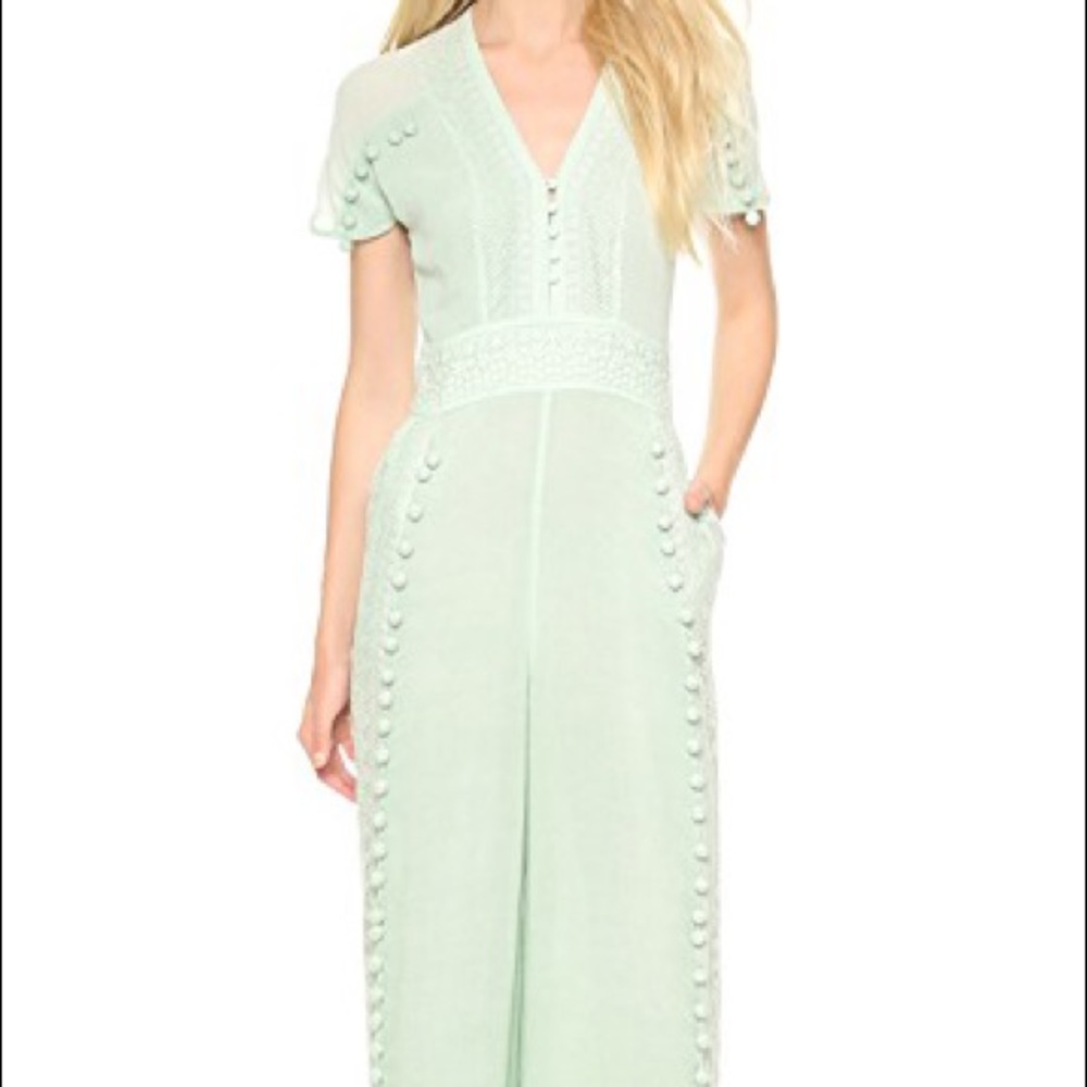 ISO Marchesa Voyage Paneled Pom Pom Jumpsuit